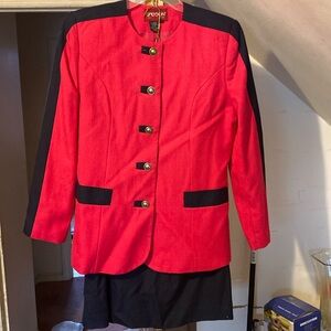 A two piece skirt suit made by Sassoon Paris new York Magenta size 10 woman’s